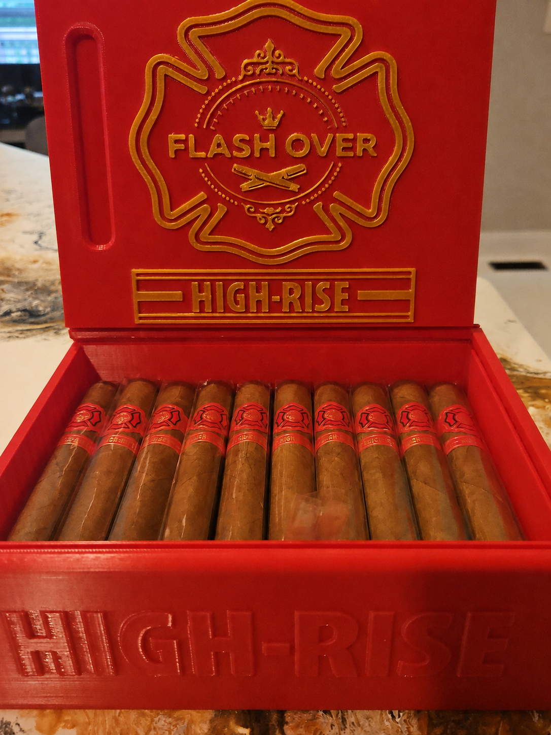 Flashover Cigars High-Rise case, open on counter